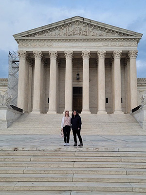 Mossman Law Office attorneys on the outside steps of the U.S. Supreme Court